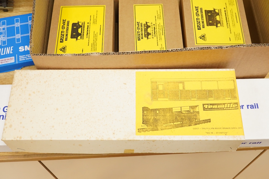 Four boxed Bassett-Lowke by Corgi 0 gauge railway freight wagons; a BR 20-ton brake van, together with two Southern Railways open wagons and a ventilated box van, together with a boxed Tenmille Products kit for a Talylly